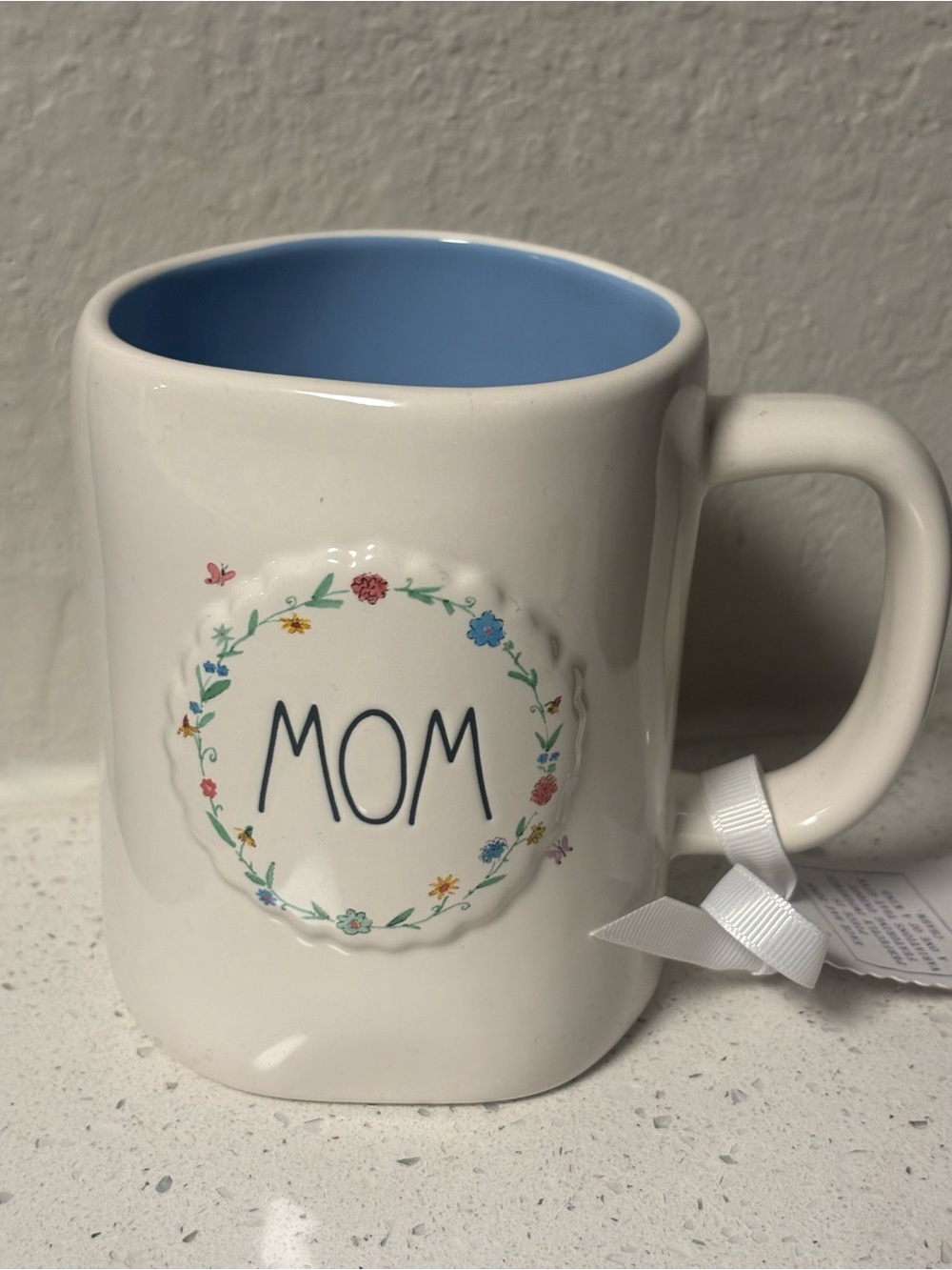 Rae Dunn White Mug with Blue Interior and Floral Wreath "MOM"